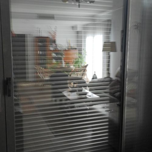 PUERTA DE ALUMINIO CORREDERA ROTURA PUENTE TERMICO